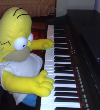 Homer_J__Simpson_playing_piano_by_TheAnonymousPoetist